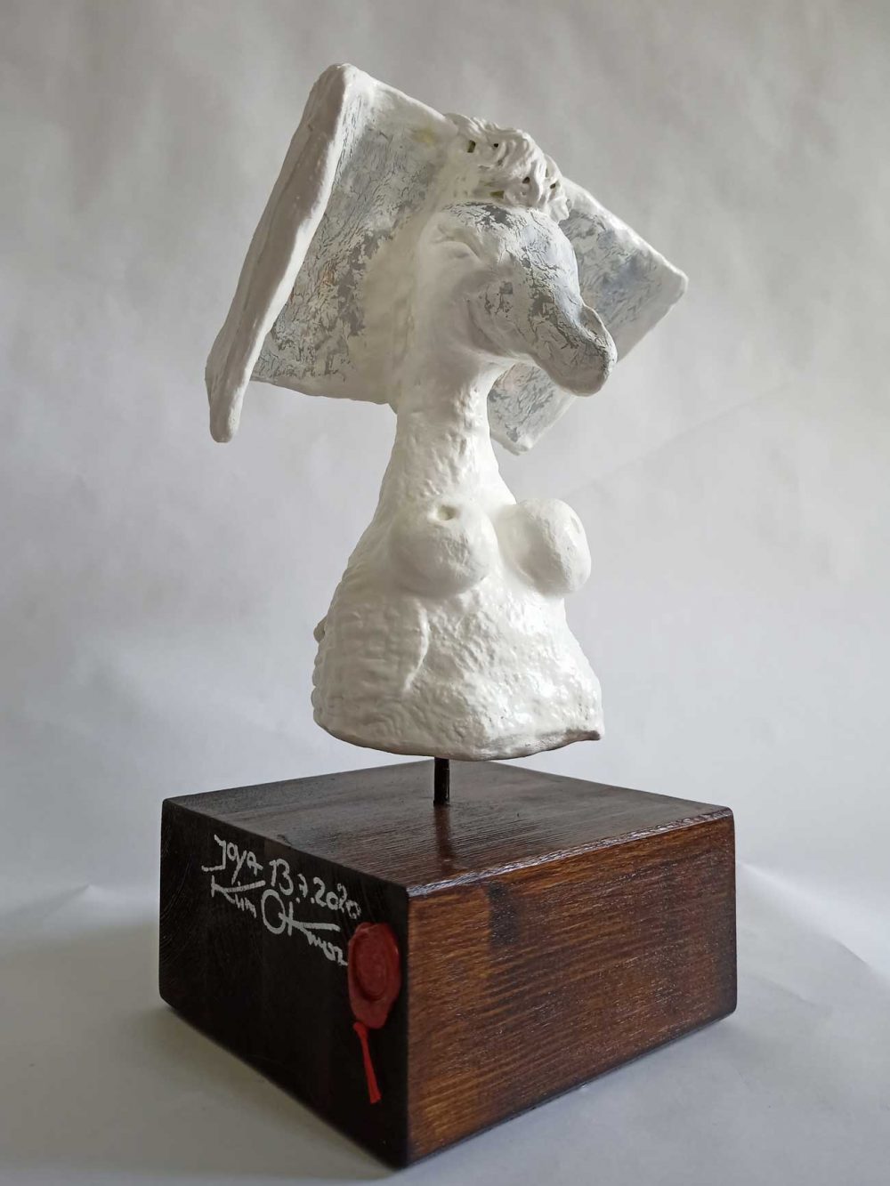 Joya neosacral sculpture on wooden base